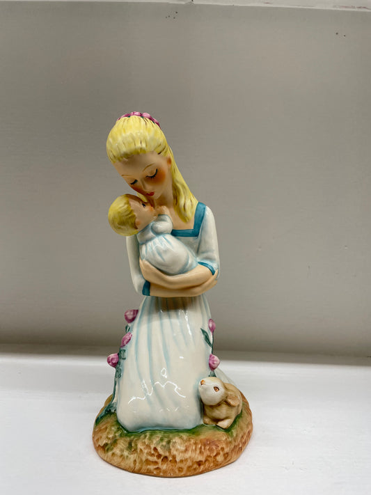 "Mother Embracing Child"