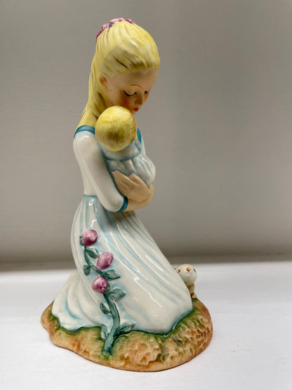 "Mother Embracing Child"