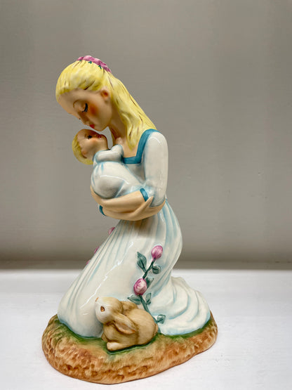 "Mother Embracing Child"