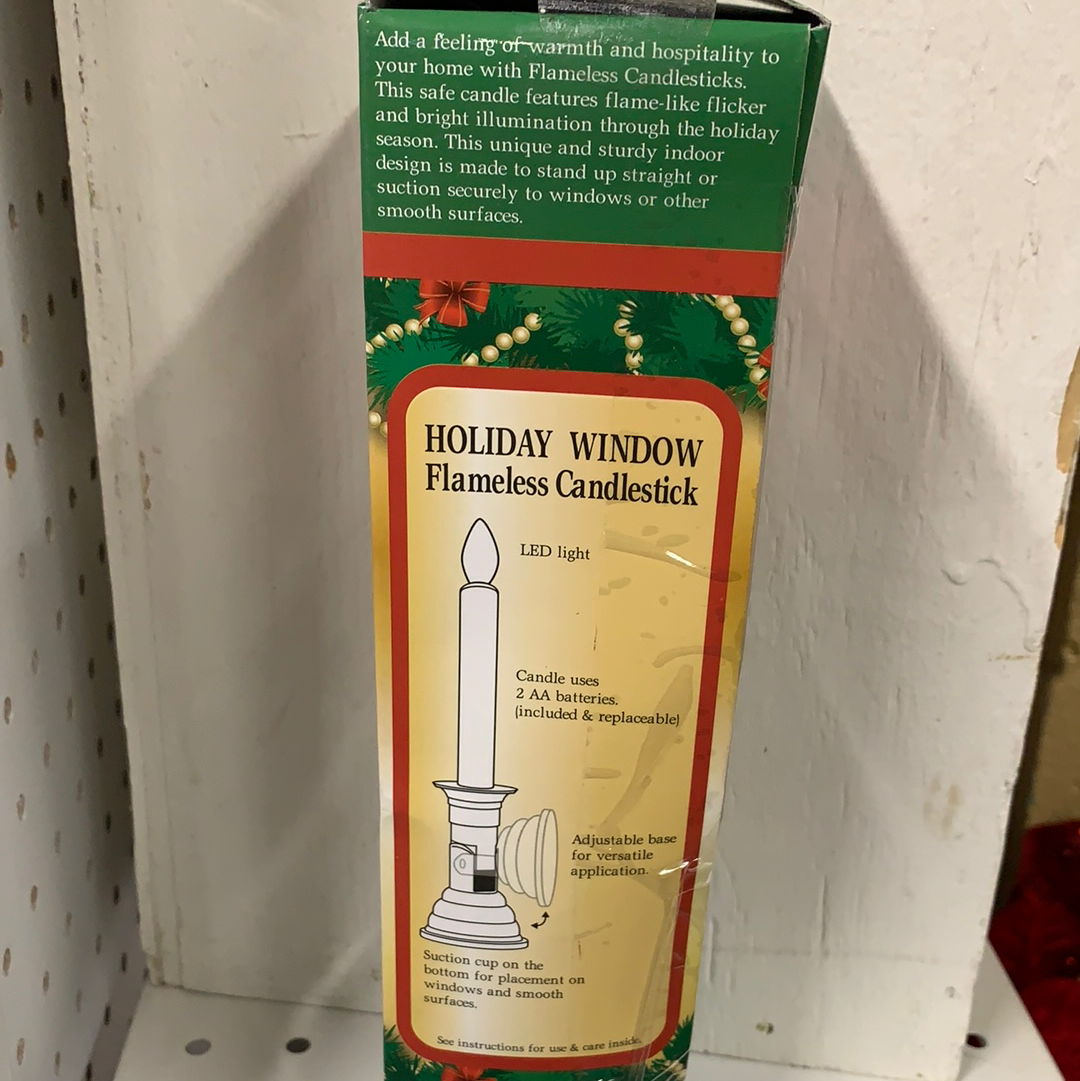 Holiday window flameless candle stick